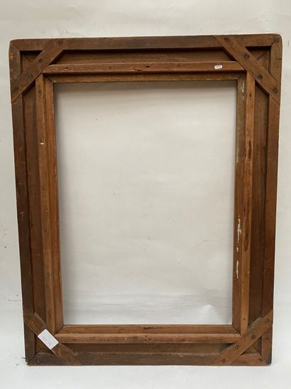 null Flat-grooved walnut frame with laurel wreaths in the corners 

Early 20th century...