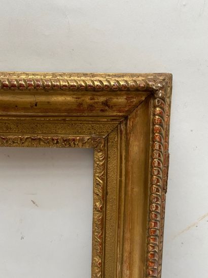 null carved and gilded moulded oak frame decorated with friezes of water leaves,...