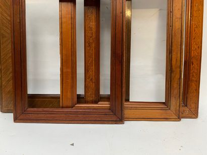 null Four FRAMES in veneer and blackened wood fillets

Late 19th century 

37 x 30...