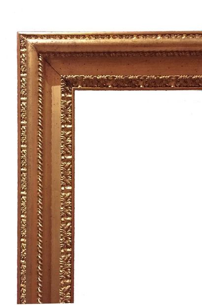 null Pair of large carved and gilded wood frames with foliated frieze and gadroons.

Italy,...