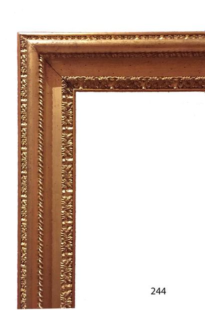 null Pair of large carved and gilded wood frames with foliated frieze and gadroons.

Italy,...