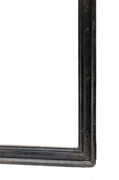 null Cassetta frame in blackened molded pine with flowers and suns decorations

Spain,...