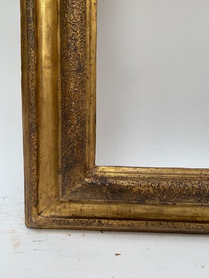 null Moulded and gilded wood frame with upside down profile, rabbets and sandblasted...