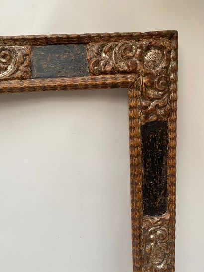 null Cassetta" frame in blackened and silvered wood with reserves in the corners...