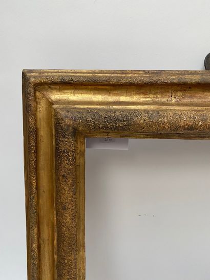  Moulded and gilded wood frame with upside down profile, rabbets and sandblasted...