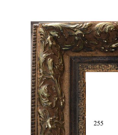 null Large GOLDEN and blackened carved wooden FRAME with foliage decoration. Napoleon...