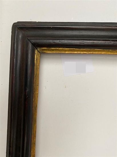 null Reverse profile frame in blackened wood with gold rebate

Italy, 18th century...