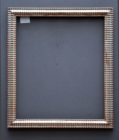 null Wooden frame with silver stucco and gadroon decoration

nineteenth century

66...