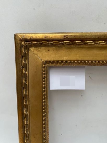 null FRAME in carved and gilded oak with beaded friezes and twisted ribbon, Infroit...