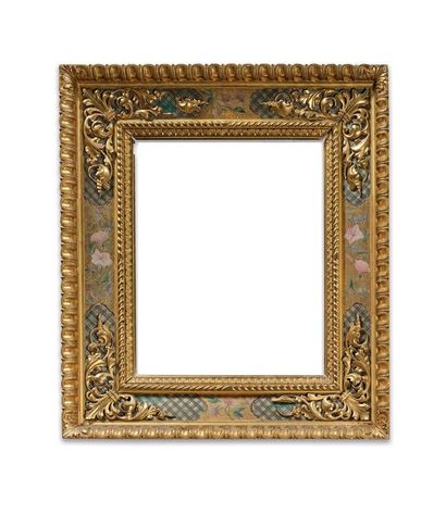 null FRAME in carved wood and gilded stucco with raise-de-coeur decoration, ropes,...