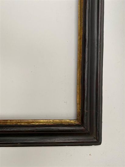 null Reverse profile frame in blackened wood with gold rebate

Italy, 18th century...