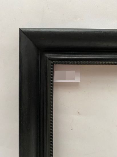 null Moulded, carved and blackened wood frame with beaded frieze decoration 

Netherlands,...
