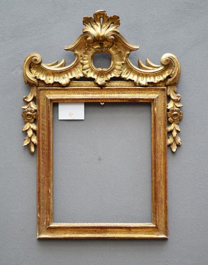 null FRAME in carved and gilded wood, on a bulinato background with an upside-down...
