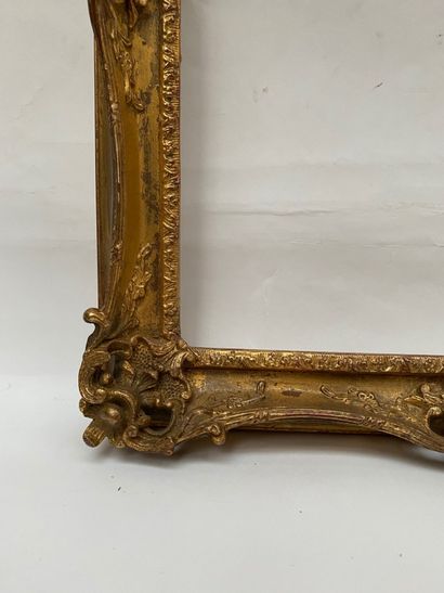 null Wooden frame and gilded stucco 

Louis XV style, 20th century 

40 x 31.5 x...