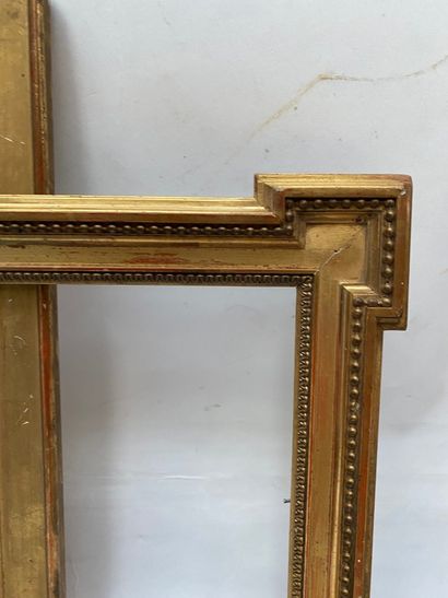 null Small wooden and gilded stucco FRAME with detached square corners edged with...