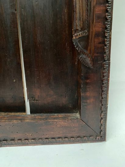 null Curious FRAME in carved and stained fruitwood, exterior rebate in a frieze of...