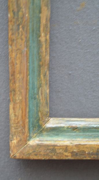 null BAGUETTE en bois mouluré anciennement argenté et peint vert .

Italie, XVIIIème...