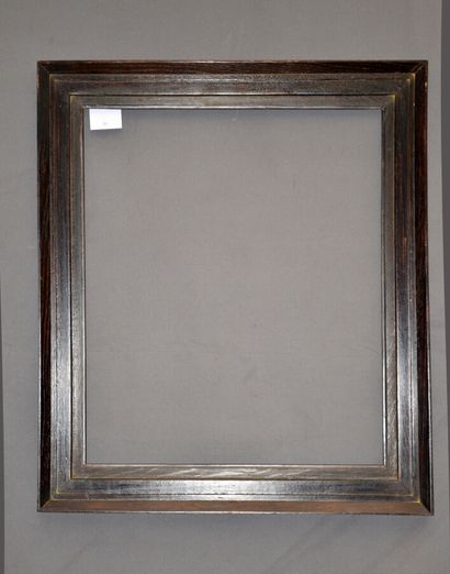 null CADRE en bois mouluré noirci à gradins

XIXème siècle

68 x 58 x 9 cm
