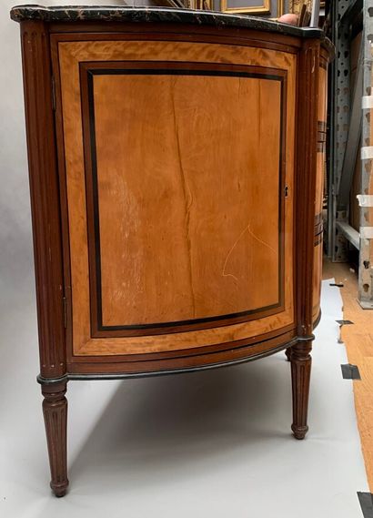 null 
A mahogany, lemon tree and ebony veneered half-moon COMMODE. The front opens...