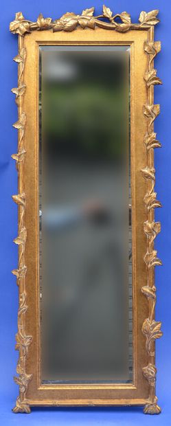 null Wood and gilded stucco rectangular mirror with vine leaves frieze, bevelled...