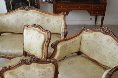 null Rocaille carved walnut living room furniture, including: a two-seater sofa,...