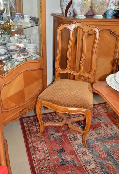 null Dining room furniture in natural wood in the Louis XV style, including: an Italian-style...