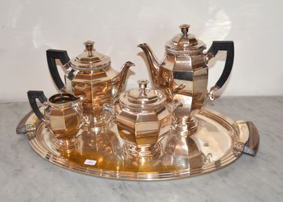 null A coffee set, 4 pieces and an oval tray (worn on the tray), in silver plated...