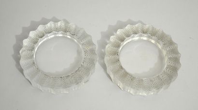 LALIQUE France 
Two round ashtrays and a...