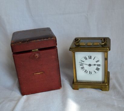 Brass officer's clock in its case 
Height...