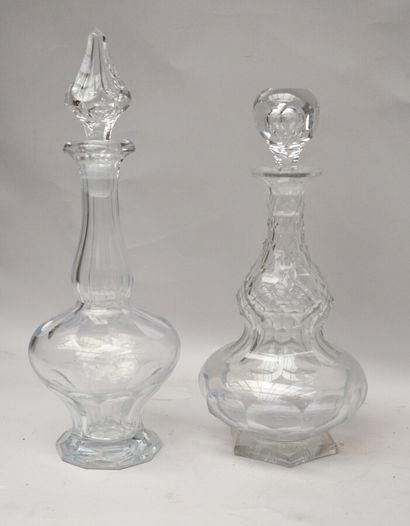 Two cut crystal CARAFES with gadroon frieze...