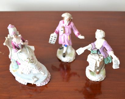 null Three polychrome porcelain groups Musical scene (one hand to be glued back)

Circa...