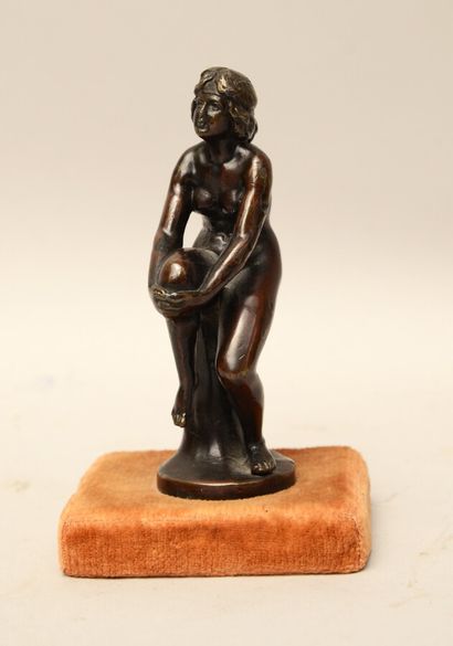  Early 20th century school 
Seated female nude 
Bronze with brown patina on a velvet...