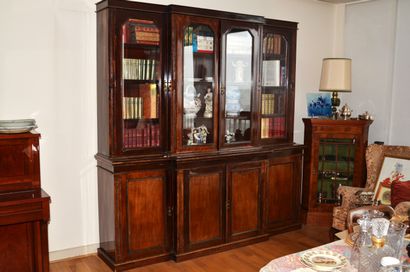 Mahogany bookcase with mahogany veneer opening...
