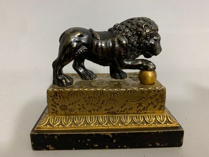  School of the XIXth century 
Lion of the Villa Medici 
Gilded bronze with a brown...