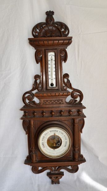 Carved wooden barometer in the Henri II style...
