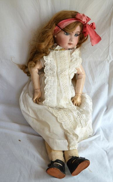 Porcelain doll, open mouth, movable arms...