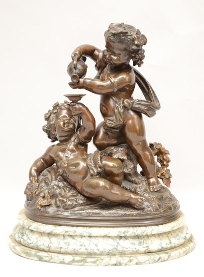  School of the XIXth century 
Bacchus child and putto 
Bronze with brown patina 
On...