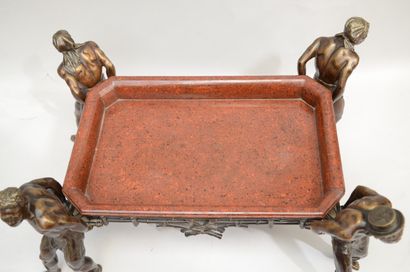 null A red lacquered wood PLATE supported by four bronze abyssinians finely chiseled...