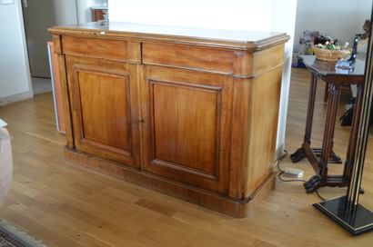 null A low mahogany veneered sideboard, opening with two moulded doors, mahogany...