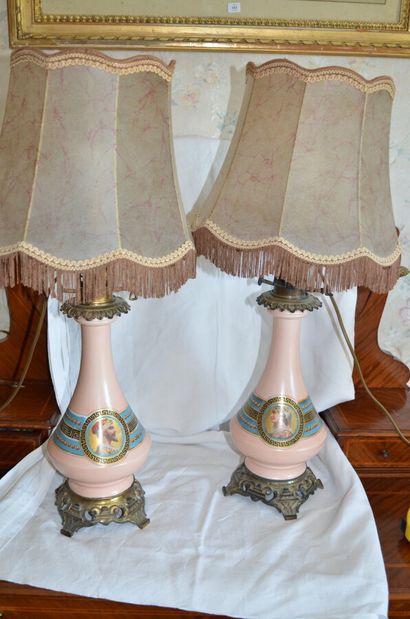 Pair of oil lamps in painted porcelain decorated...