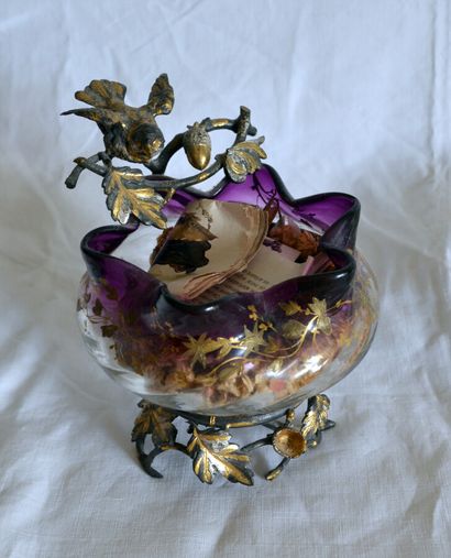 null Skirted glass bowl with bronze mountings composed of stems with acorns and birds

around...