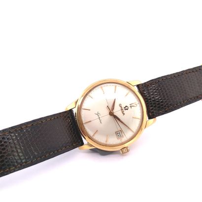  OMEGA 
GOLD WATCH (750), gilt enamelled dial, baton hour markers and Arabic numeral,...