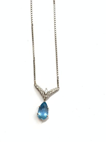 null NECKLACE in white gold (750) set with an aquamarine and small brilliant-cut...