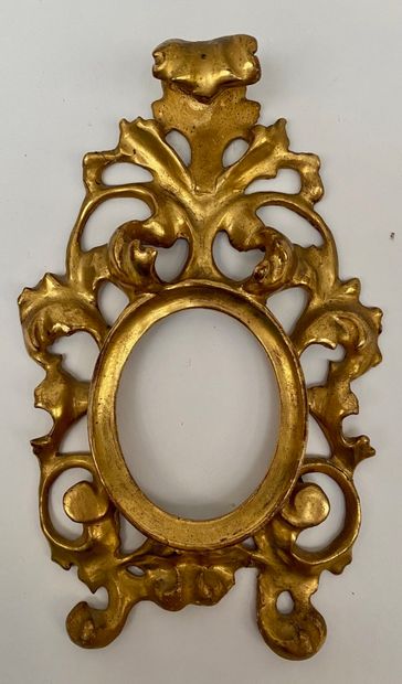Small oval frame with openwork acanthus leaves...