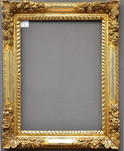 Wooden frame, carved and gilded in the mecca...