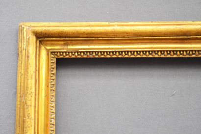 null Molded and gilded wooden frame decorated with a frieze of pearls (modified in...