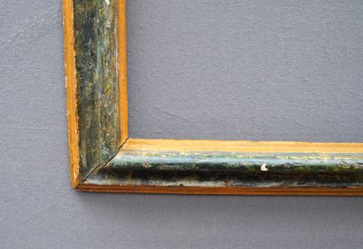 null A yellow and green marbled wood frame with a reversed profile.

Italy, Marche,...
