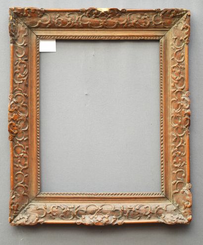 Carved oak frame with Bérain decoration (missing,...
