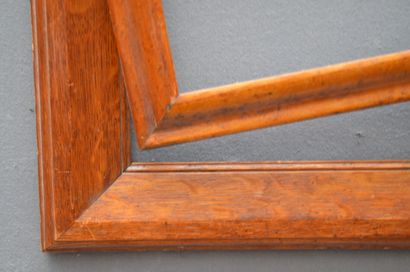 null Two FRAMES, one in moulded oak and the other with a reversed profile in fruitwood...