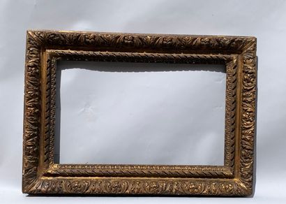 null Oak and stucco frame with twisted ribbons and acanthus leaves. (Small accidents...